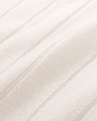 Close-up of a textured white fabric with diagonal lines
