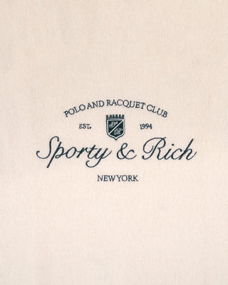 Logo of Polo and Racquet Club Sporty & Rich on a beige background