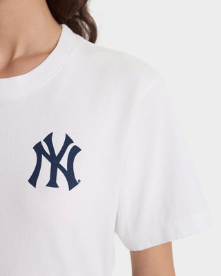 White t-shirt with a navy blue logo on a white background