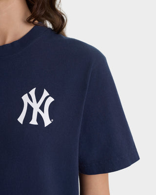 Navy blue t-shirt with a white logo on a plain background