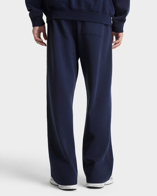 Navy blue sweatpants on a white background