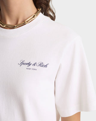 White t-shirt with 'Sporty & Rich New York' logo on a white background