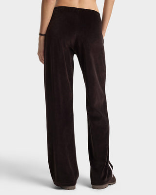 Black wide-leg pants worn by a person on a white background