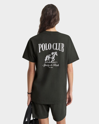 Person wearing a black t-shirt with 'Polo Club' logo on the back, on a white background
