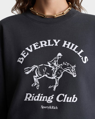 Black sweatshirt with 'Beverly Hills Riding Club' graphic and 'Sporty&Rich' branding.