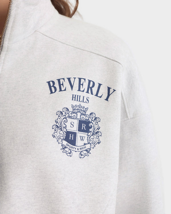 White jacket with 'Beverly Hills' logo on a white background
