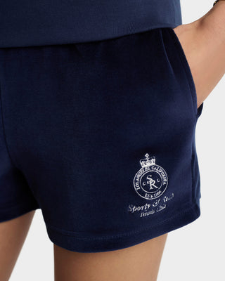 Navy shorts with a logo on a plain background
