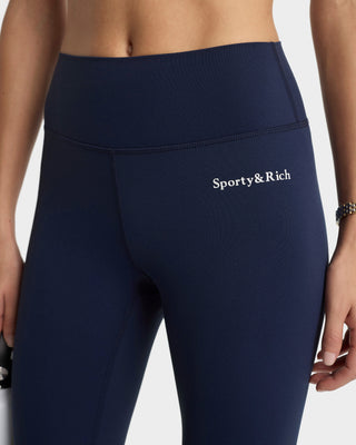 Navy leggings with 'Sporty&Rich' logo on a white background