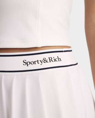 White garment with 'Sporty&Rich' logo on a white background