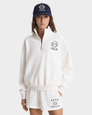 Person wearing a Yale branded outfit on a white background