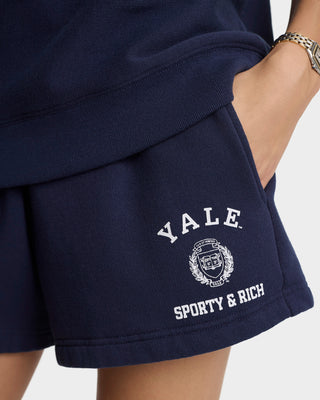Navy shorts with 'Yale Sporty & Rich' logo on a white background