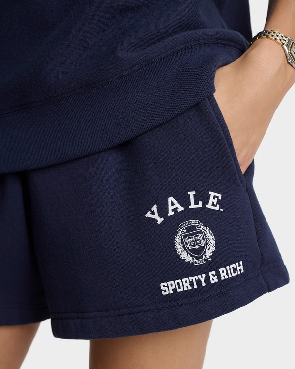 Navy shorts with 'Yale Sporty & Rich' logo on a white background