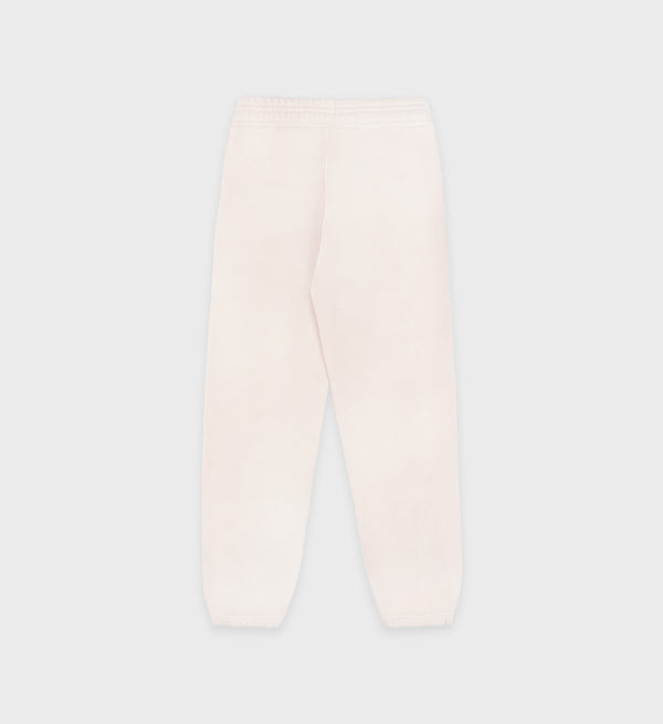 Light cream baby leggings on a light gray background