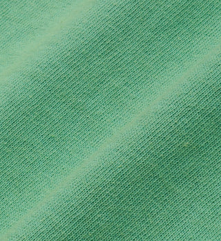 A close-up of the LA Racquet Club T-Shirt - Verde/White, made in the USA from 100% USA-grown cotton.