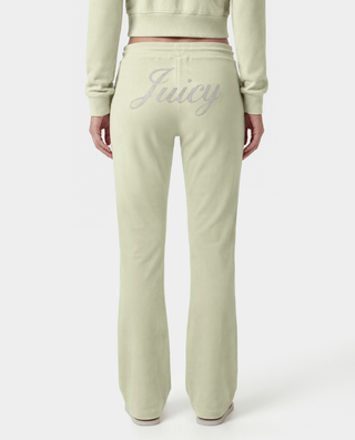 Light green sweatshirt and pants with 'Juicy' branding on a white background