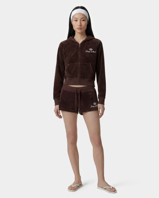 woman wearing a brown towel set with a logo on a white background