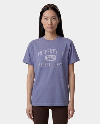 Person wearing a purple t-shirt with 'PROPERTY OF S&R ATHLETIC DEPT.' text on a white background