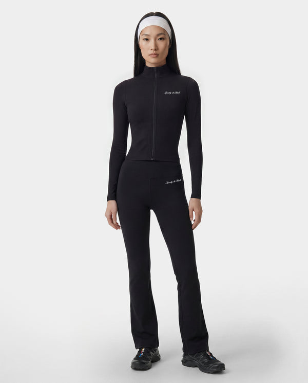 Person wearing a black athletic outfit on a white background