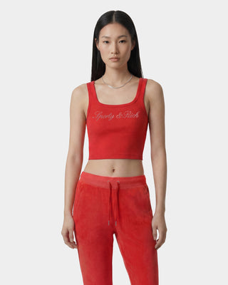 Woman wearing a red tank top and pants with 'Gloomy & Rich' branding on a white background