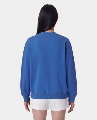 LA Serif Crewneck - Team Blue/White, an oversized crewneck crafted from 100% cotton in team blue, features a white LA logo on the left chest and is displayed laid flat on a white background.