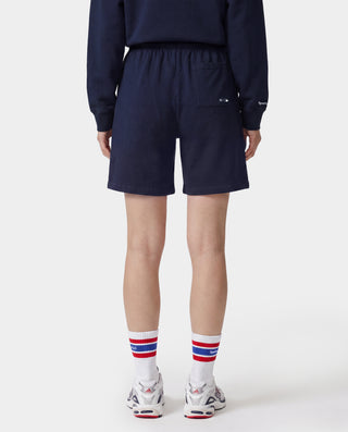 Dodgers Serif Gym Short in Dark Navy/White, featuring LA and Sporty & Rich logos on the front, an elastic waistband, crafted from 100% cotton in Portugal. Presented against a white background.