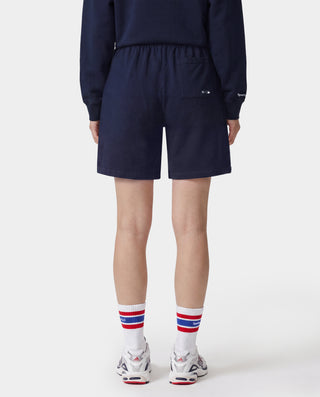 Dodgers Serif Gym Short in Dark Navy/White, featuring LA and Sporty & Rich logos on the front, an elastic waistband, crafted from 100% cotton in Portugal. Presented against a white background.