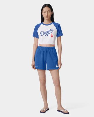 Dodgers Serif Gym Shorts in Team Blue/White, made in Portugal from 100% cotton, featuring white Sporty & Rich and LA logos printed on the left leg.