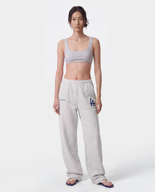 Introducing the LA Serif Wide Sweatpant in Heather Gray/Navy, featuring a wide leg silhouette with navy Sports & Rich and a large LA logo printed on the front. Made from 100% cotton, these sweatpants offer an elastic waistband for ultimate comfort.