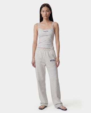 Wellness Ivy Wide Sweatpant in Heather Gray/Light Navy, featuring "WELLNESS" text on the left pocket and crafted from 100% cotton with an elastic waistband, displayed on a plain white background.