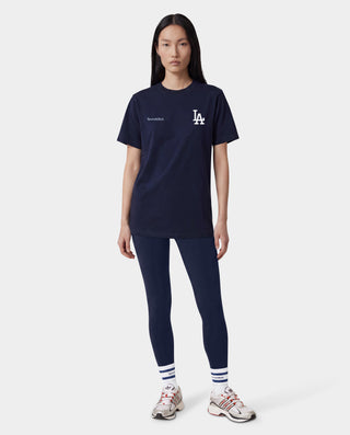 Dodgers Serif T-Shirt in Dark Navy/White, made from 100% cotton, features Sporty & Rich and LA logos in white on the upper front and offers an oversized fit.