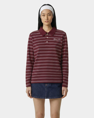 Woman wearing a maroon and white striped long-sleeve shirt with a brand logo on a white background