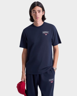 Person wearing a navy blue t-shirt and pants with 'SRWC' logo on a white background