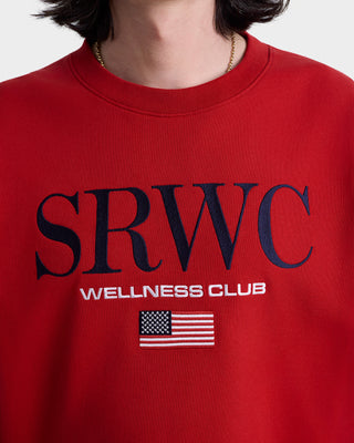 Red sweatshirt with 'SRWC Wellness Club' text and American flag on a plain background
