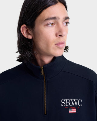 Person wearing a black jacket with SRWC logo on a white background