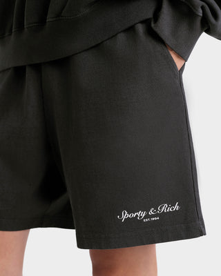 Black shorts with 'Sporty & Rich' logo on a white background