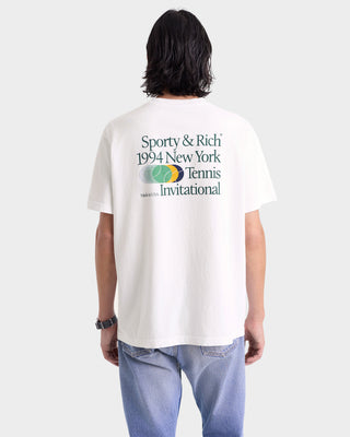Person wearing a white t-shirt with 'Sporty & Rich' text and logo on a plain background