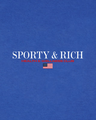 Blue shirt with 'Sporty & Rich Health & Wellness Club' text and American flag logo.