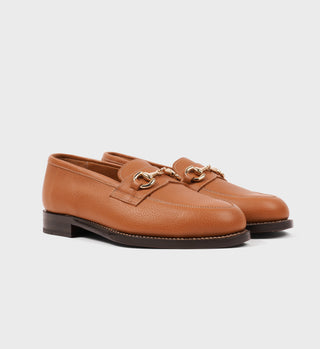 Camel colored Penny Loafer with a gold tone horsebit on the front, made from full grain leather with contrasting stitching.