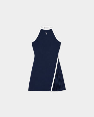 A sleeveless navy blue dress with a high neckline, white contrast trim, and a pleated side panel, shown on a light gray background.