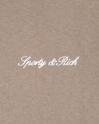 Text 'Sporty & Rich' on a beige textured background