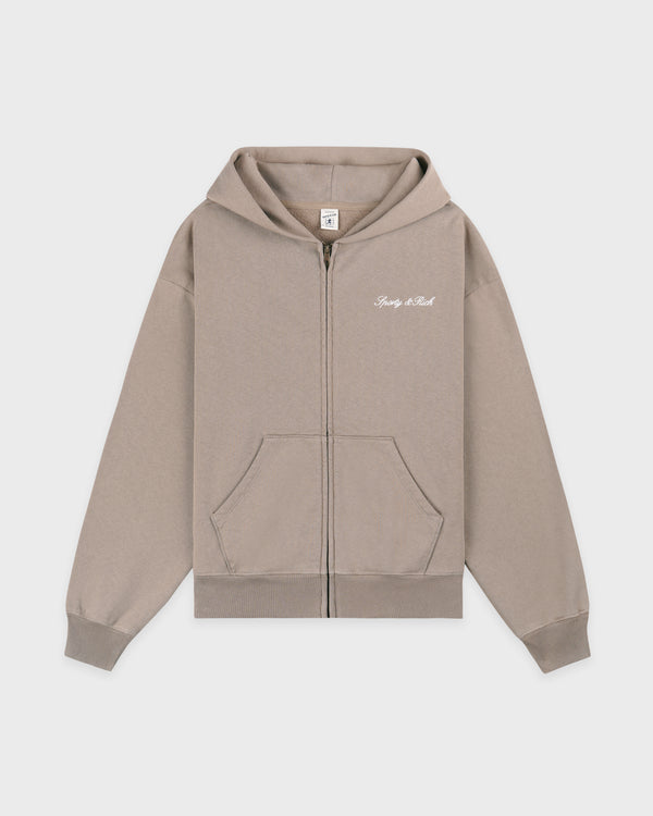 Signature Logo Embroidered Zip Hoodie in Hazelnut/White featuring an oversized fit, front pockets, and small white script text embroidered on the left chest. Crafted from 100% cotton for superior comfort.