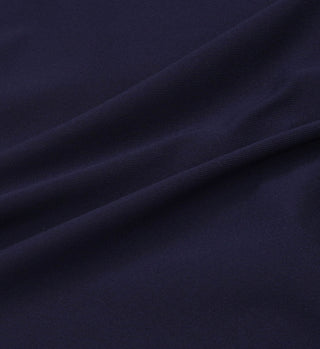 Close-up of dark navy blue fabric with visible texture and soft folds—ideal for the elastic waistband on the Prince Sporty Court Skirt - Navy/White.