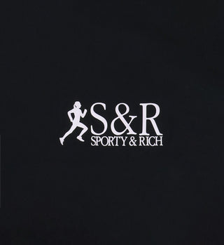 The SR Runner Active Short - Black/White features a black background with the signature S&R Sporty & Rich logo and a white running figure, complemented by an elastic waistband.