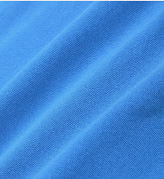 Close-up of bright blue SR 94 Sports Tee - Blue/White, featuring garment-dyed fabric with visible texture and soft folds—perfect for a vibrant, pre-shrunk sports tee that stays fresh wash after wash.