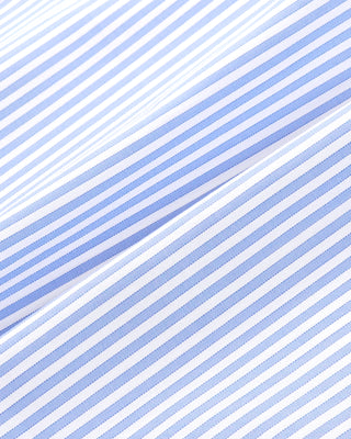 Pattern of blue and white horizontal stripes on a light blue background