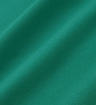 Close-up of teal fabric with a soft texture