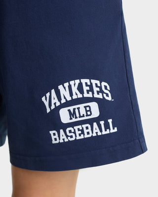 Navy blue shorts with 'Yankees MLB Baseball' text on a white background