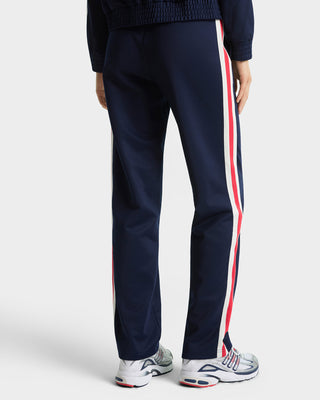Navy tracksuit with red and white stripes on a white background