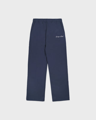 Navy blue pants with white text on a light gray background