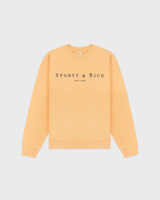 Yellow sweatshirt with 'Sporty & Rich' logo on a light gray background